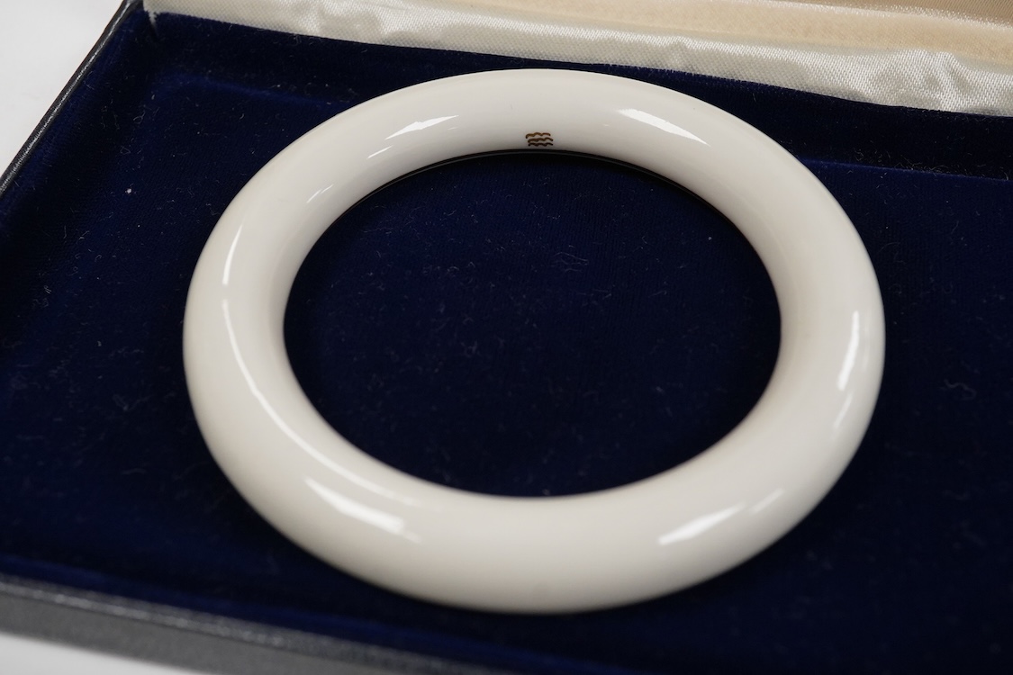 A 9ct and cabochon black onyx set pendant, on a 9ct chain, a 9ct and gem set ring and pair of 9ct and cultured pearl set ear clips, together with other items including costume jewellery, a silver bangle and a silver book